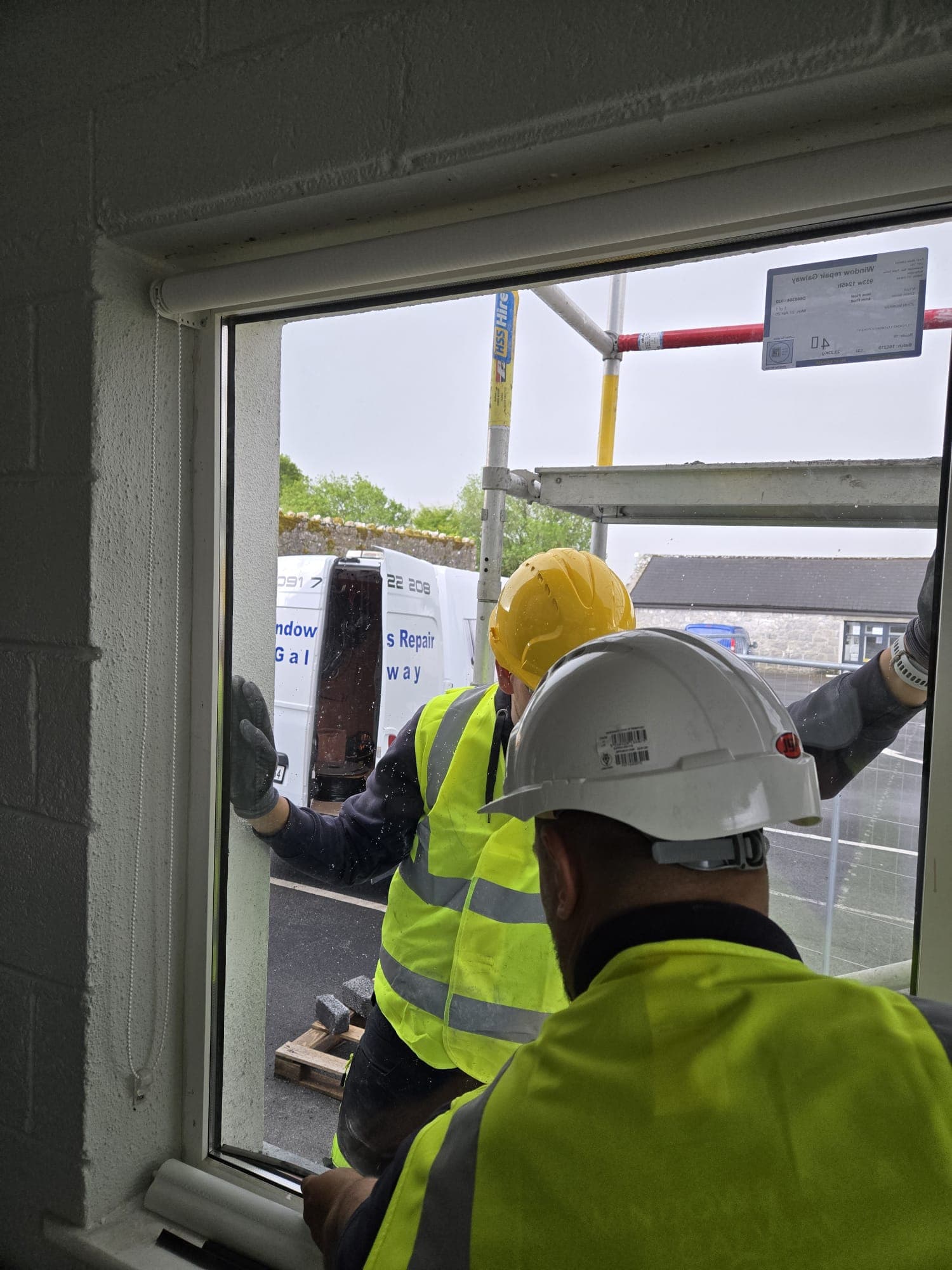 Tradesman working on a real window and door upgrade job in Galway.